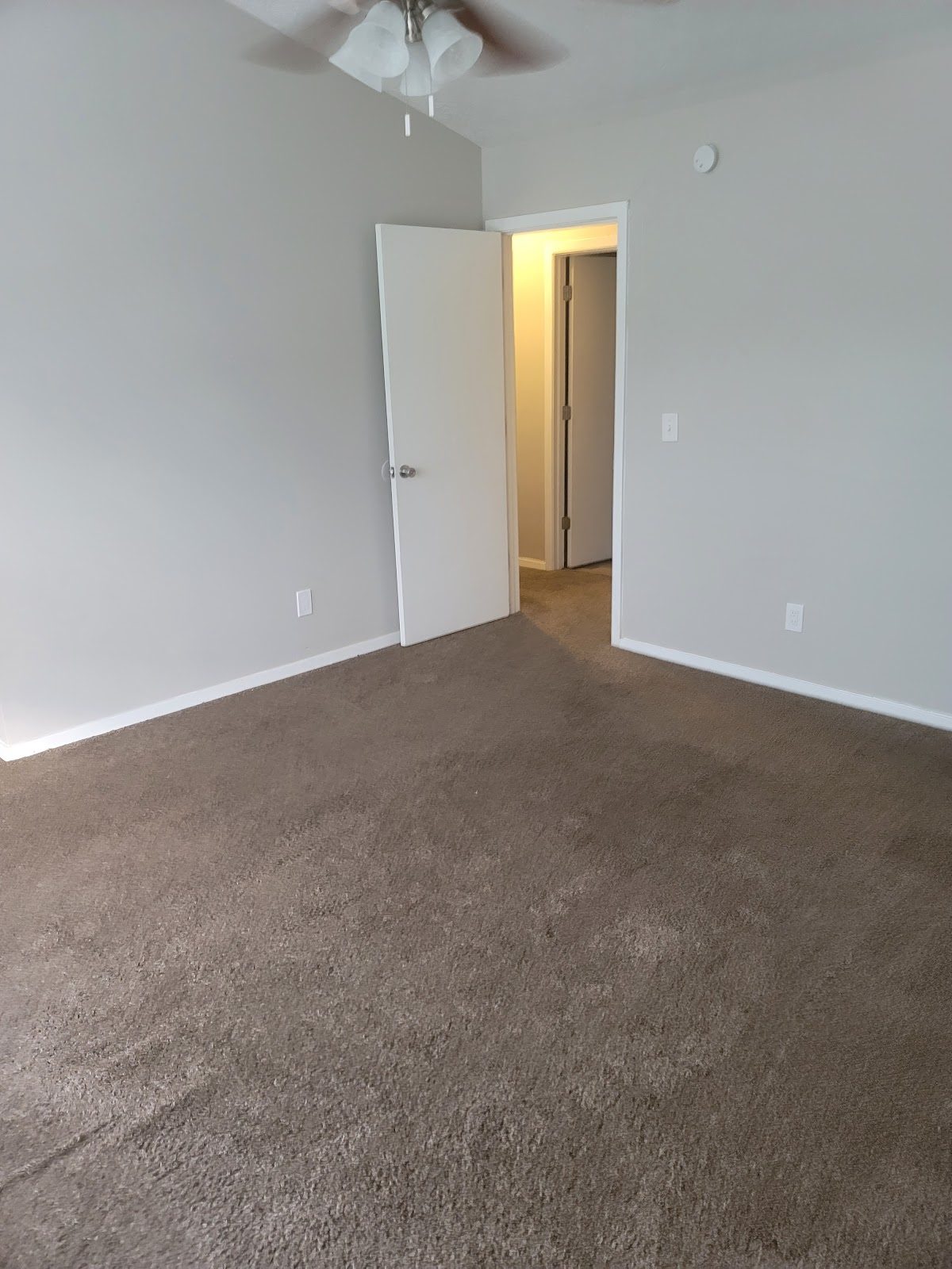 Finished carpeted room after renovation